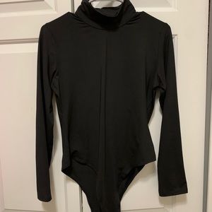 Black turtleneck body suit
